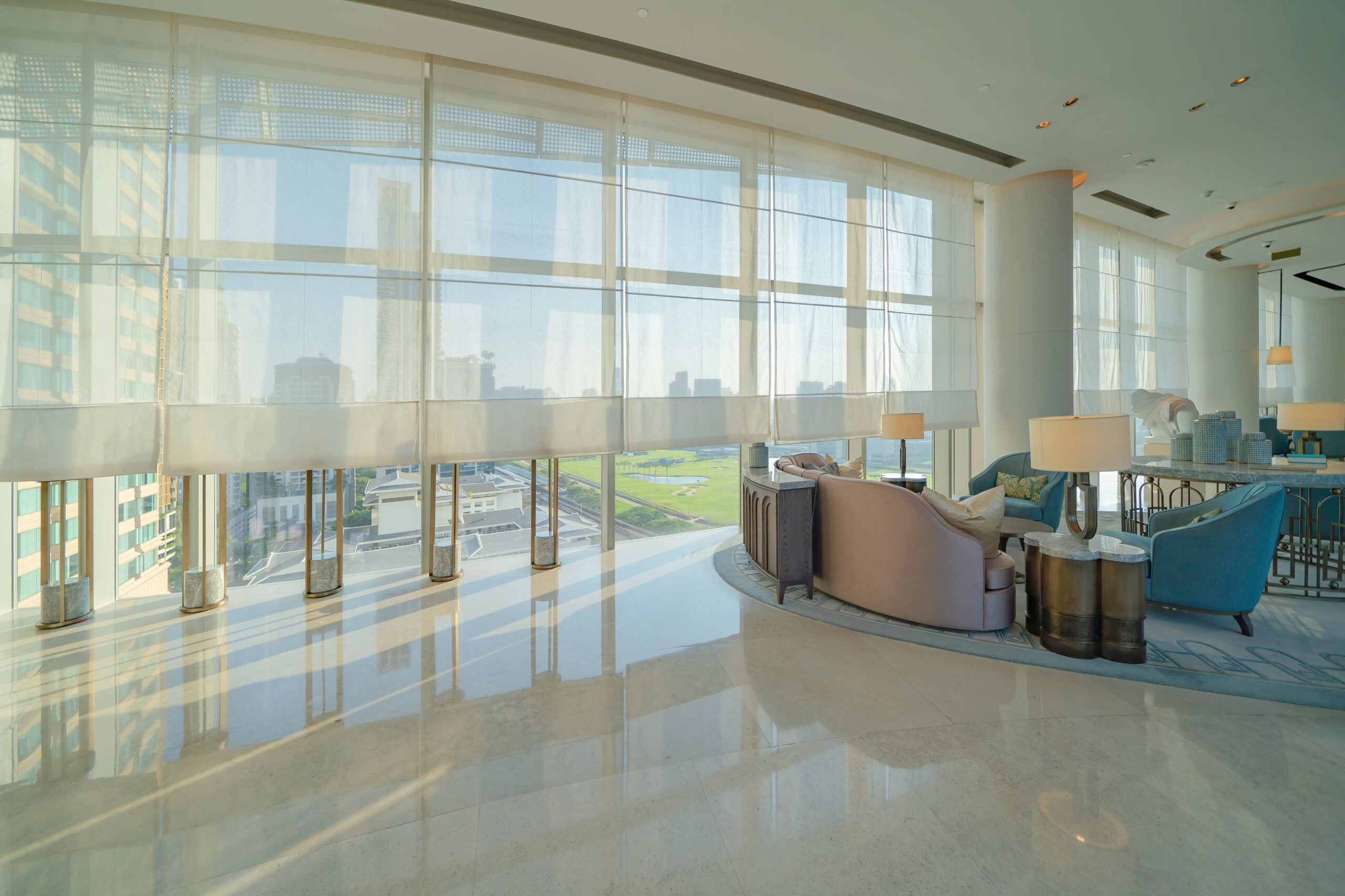 Bright modern hotel lounge with city views