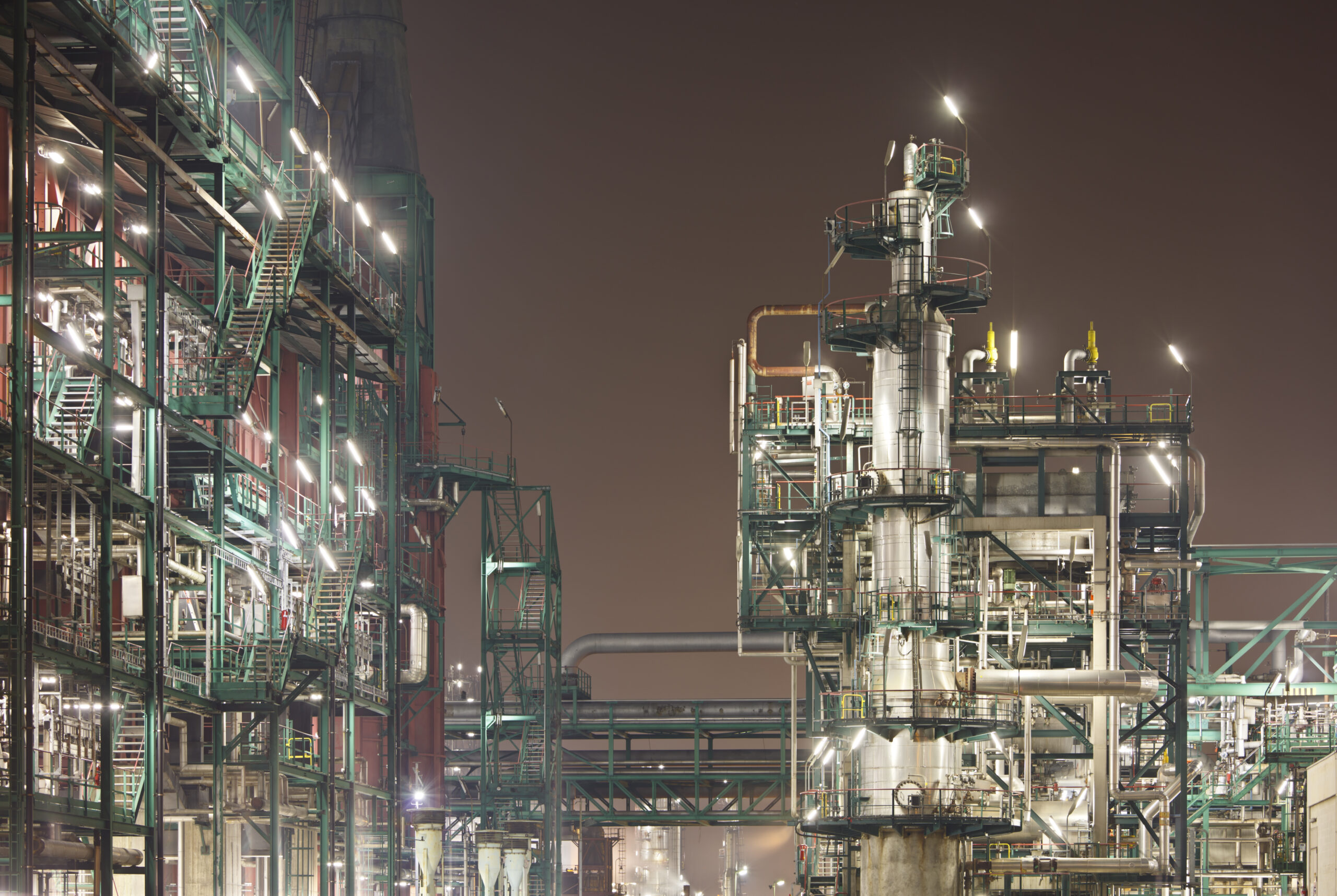 Industrial oil refinery complex at night